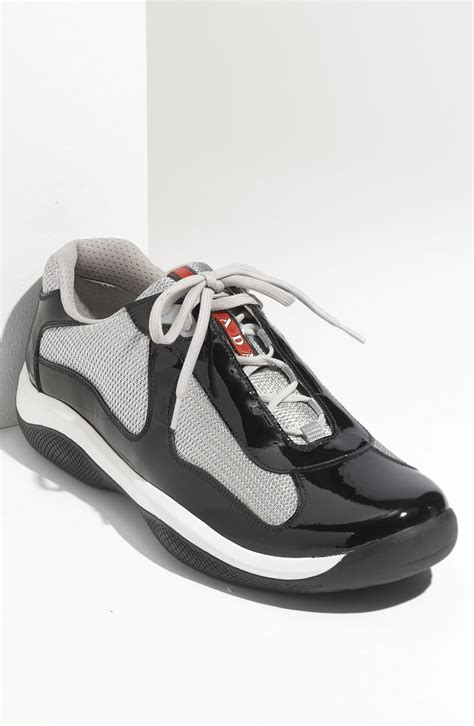 black and silver prada sneakers.